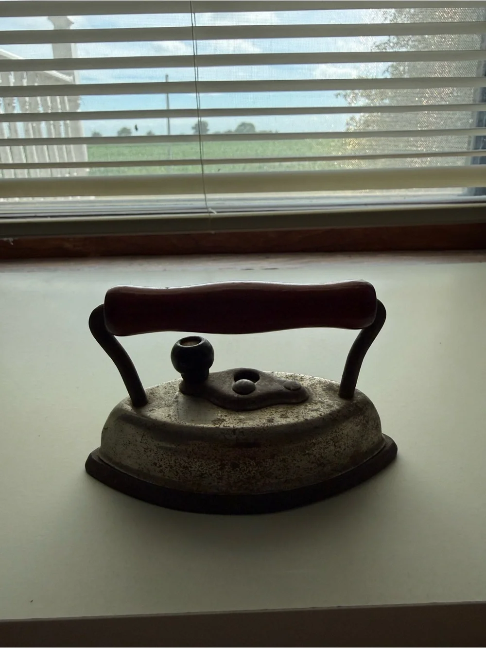 Antique-Style Cast Iron Childs Dolly Clothing Iron with Wooden Handle - Red